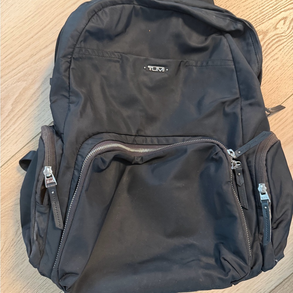 Tumi Black Nylon Backpack with Front Zip Pockets
